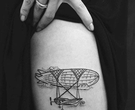 线条大臂飞艇纹身图案