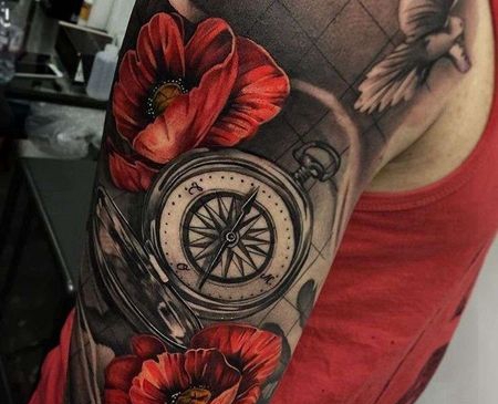 写实大腿花卉指南针纹身图案