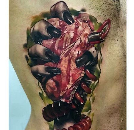 New School侧腰手心脏纹身图案