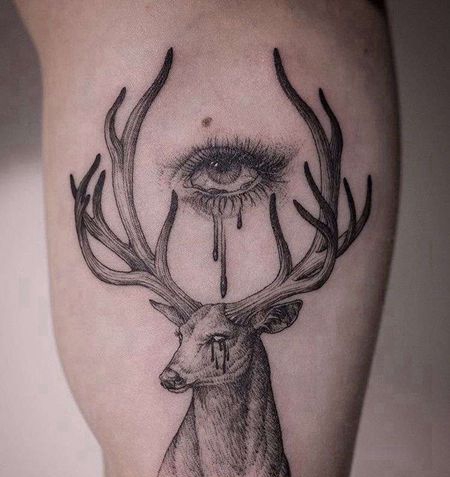 小清新大臂鹿眼睛纹身图案