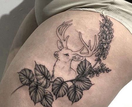 点线大腿鹿叶子纹身图案