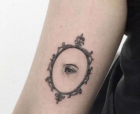 小臂镜子眼睛纹身图案
