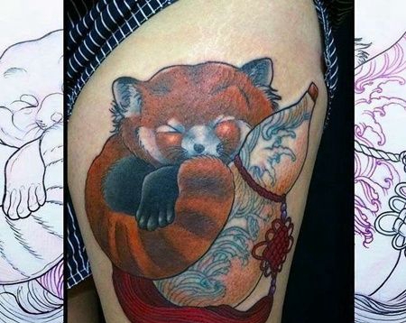 新传统大臂浣熊纹身图案
