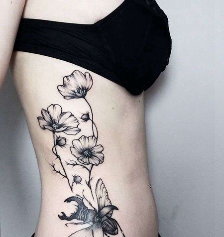点刺侧腰花卉甲虫纹身图案