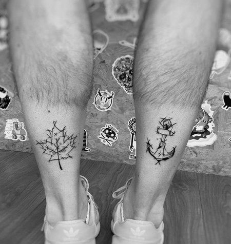 线条小腿枫叶船锚纹身图案