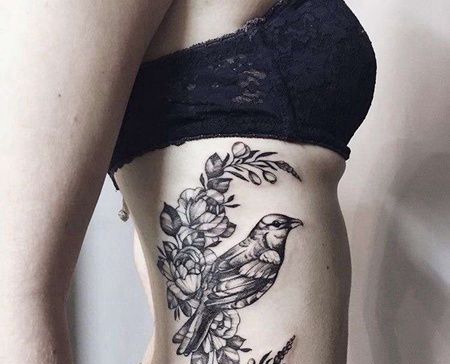 点线侧腰鸟花卉纹身图案