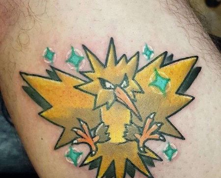 卡通大腿神奇宝贝闪电鸟纹身图案