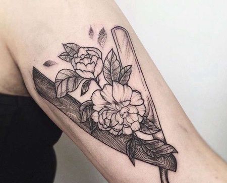 点线小臂折刀花卉纹身图案