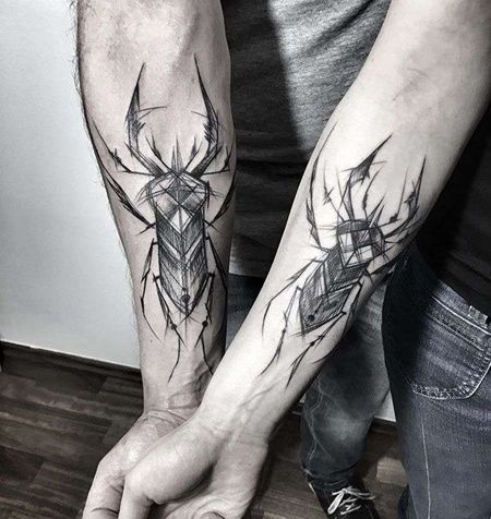 线条小臂甲虫纹身图案