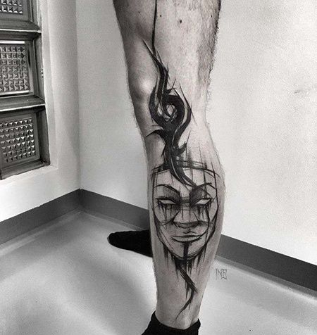 线条小腿面具纹身图案