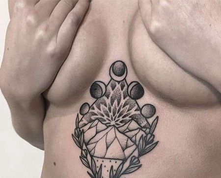 几何胸下山纹身图案