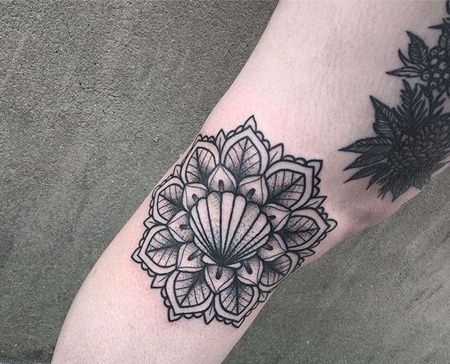 几何小臂贝壳花卉纹身图案