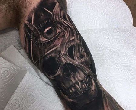 写实大臂骷髅眼睛纹身图案
