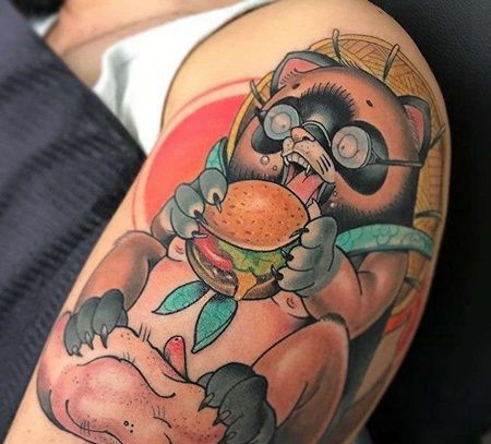 New School大臂浣熊纹身图案