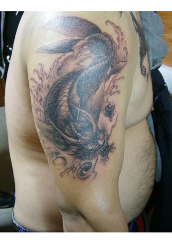 南昌天使烙印纹身秀图吧作品:手臂麒麟纹身图案