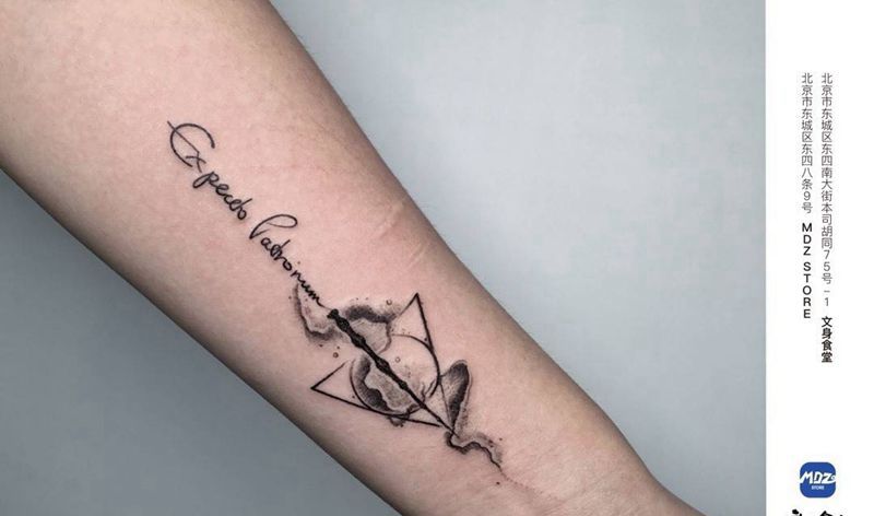 无标题纹身图片_手臂点刺纹身图案