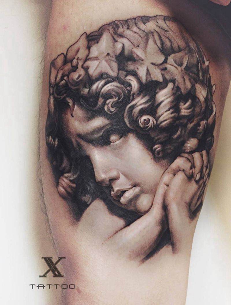 天使头像纹身图片_成品腿部欧美宗教写实纹身图案