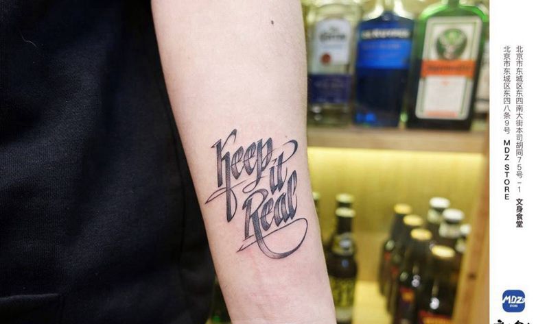 无标题纹身图片_手臂花体字纹身图案