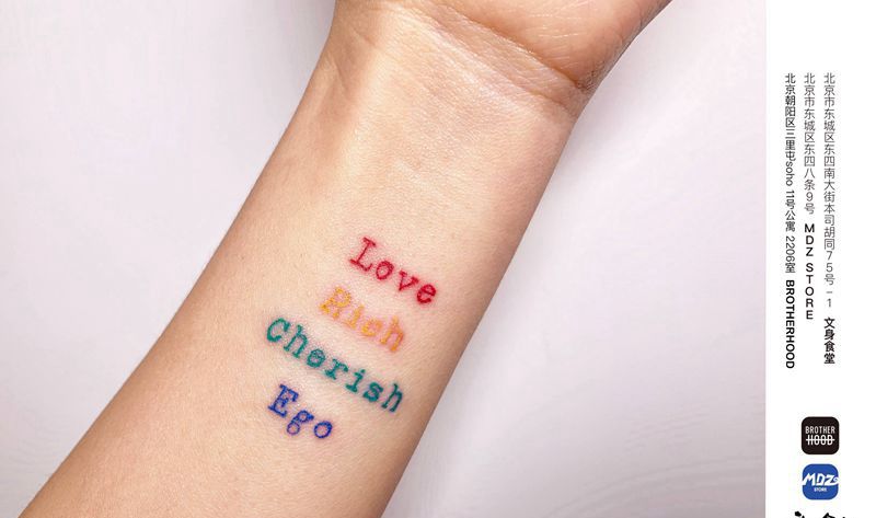 无标题纹身图片_手臂水彩英文纹身图案