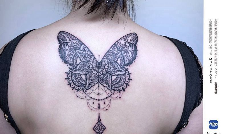 无标题纹身图片_背部点刺纹身图案