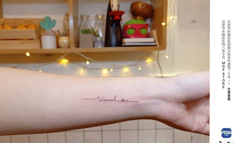 无标题纹身图片_手臂文字纹身图案