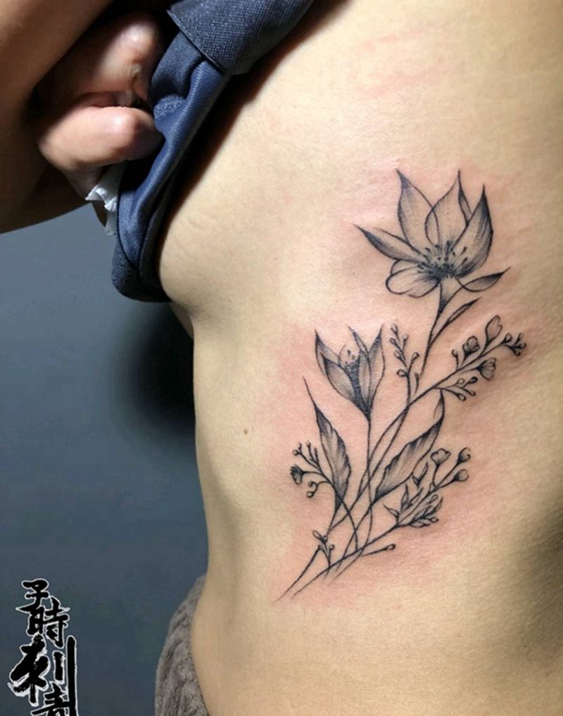 素花纹身图片_腰部纹身图案