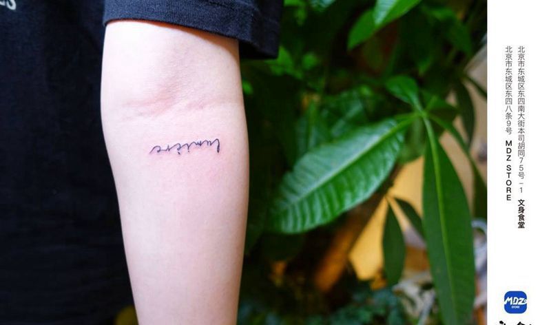 无标题纹身图片_手臂文字纹身图案