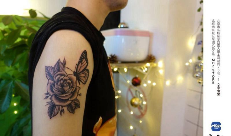 花纹身图片_手臂新传统纹身图案