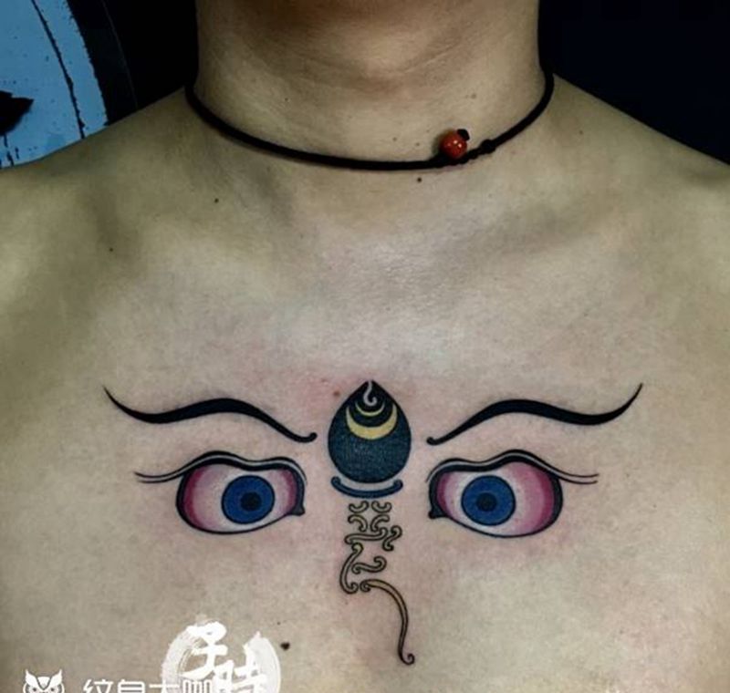 财神之眼纹身图片_胸部传统原创成品纹身图案