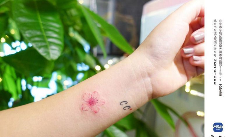 花纹身图片_手臂水彩纹身图案