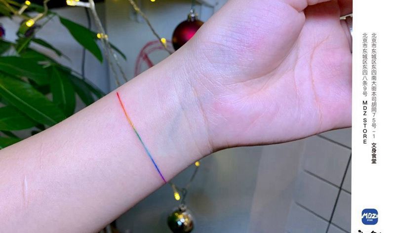 无标题纹身图片_手臂水彩直线纹身图案