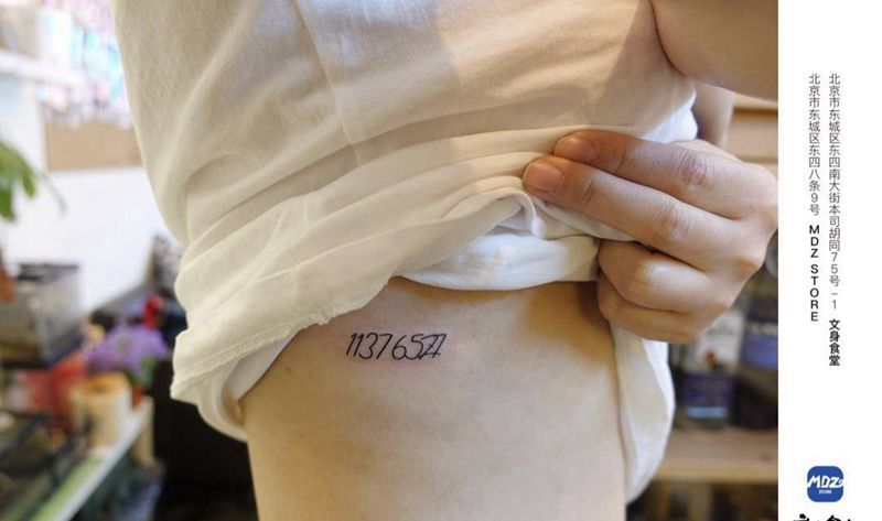 无标题纹身图片_腰部数字纹身图案