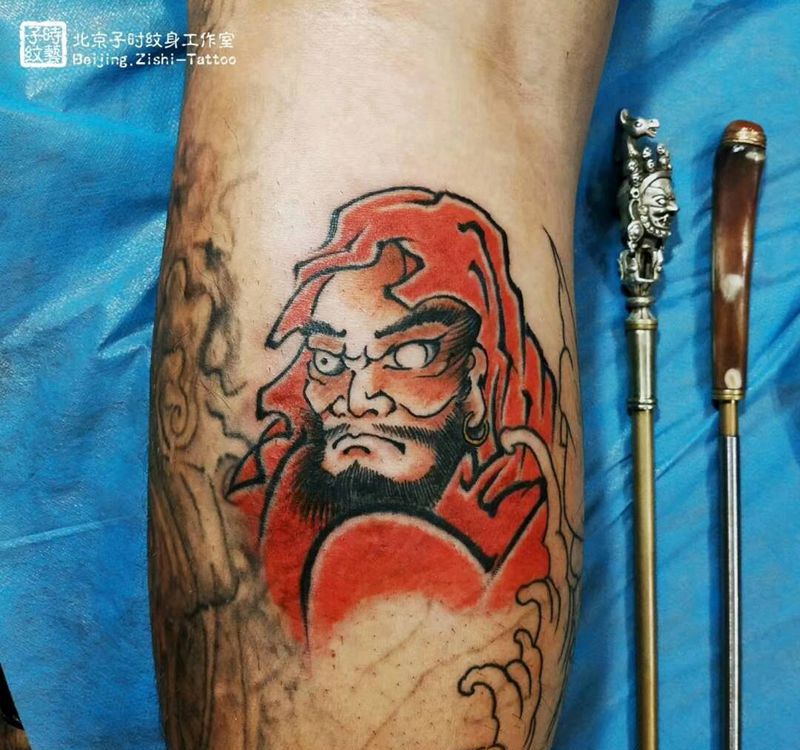 达摩纹身图片_腿部老传统手针纹身图案