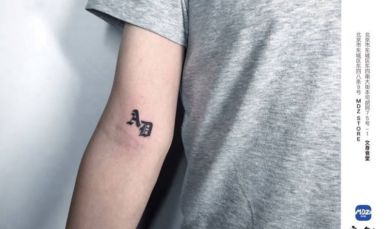 无标题纹身图片_手臂花体字纹身图案