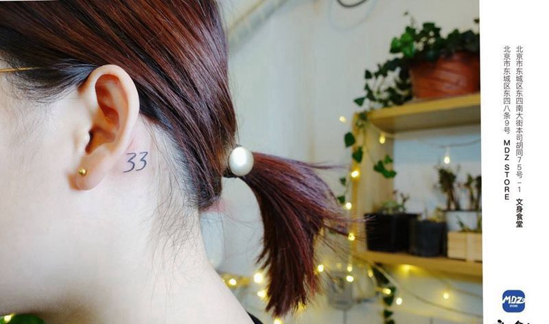 33纹身图片_颈部数字纹身图案