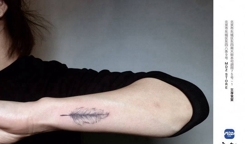 无标题纹身图片_手臂点刺纹身图案