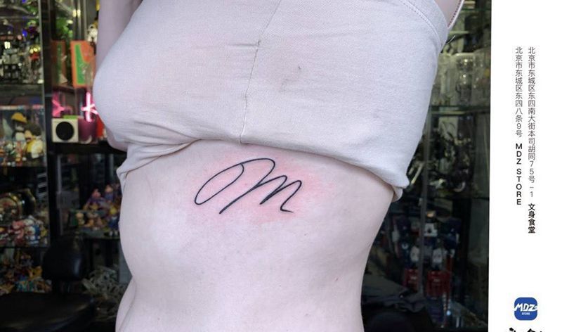 m纹身图片_腹部英文纹身图案