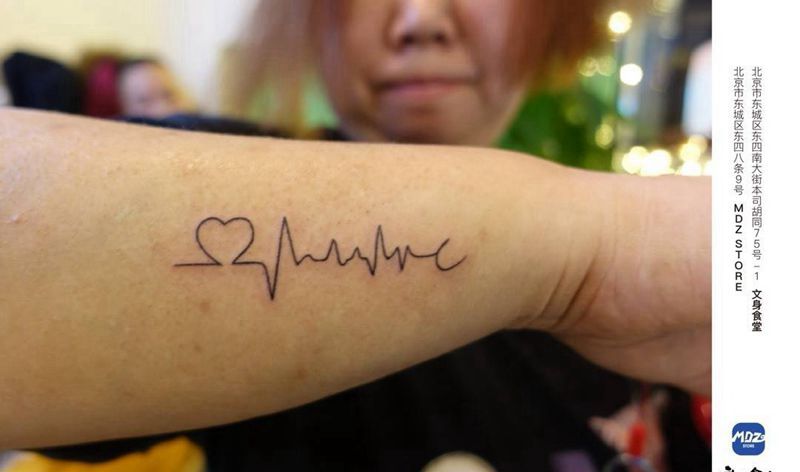 无标题纹身图片_手臂文字纹身图案