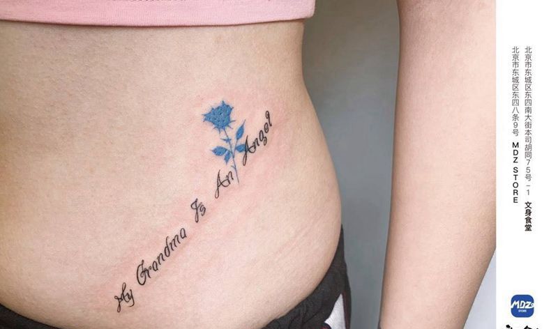 无标题纹身图片_腹部水彩英文纹身图案