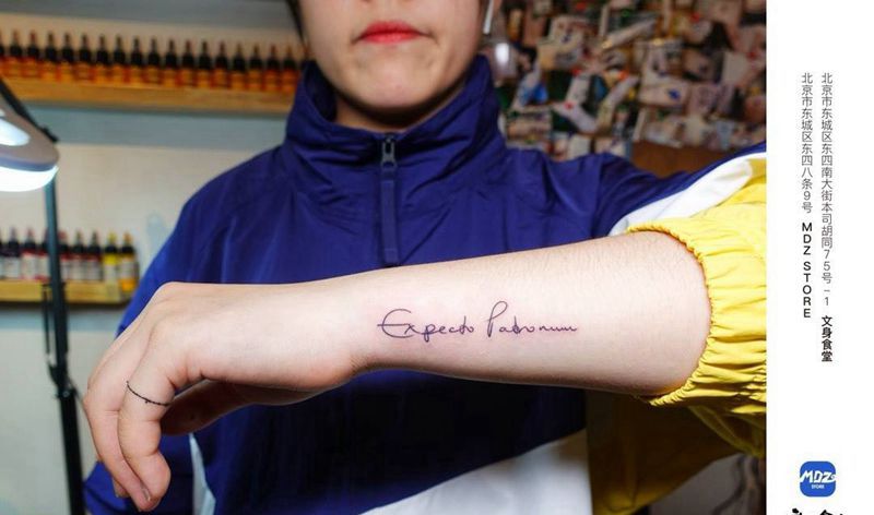 无标题纹身图片_手臂文字纹身图案