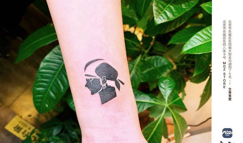 左隆纹身图片_手臂New School纹身图案