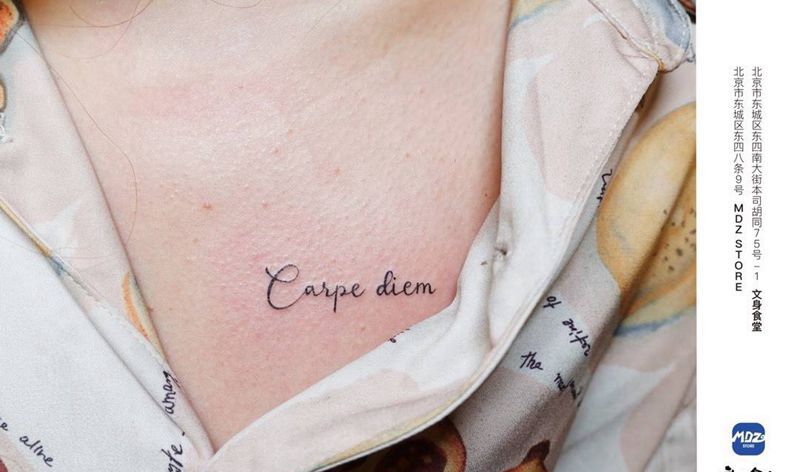 无标题纹身图片_胸部文字纹身图案