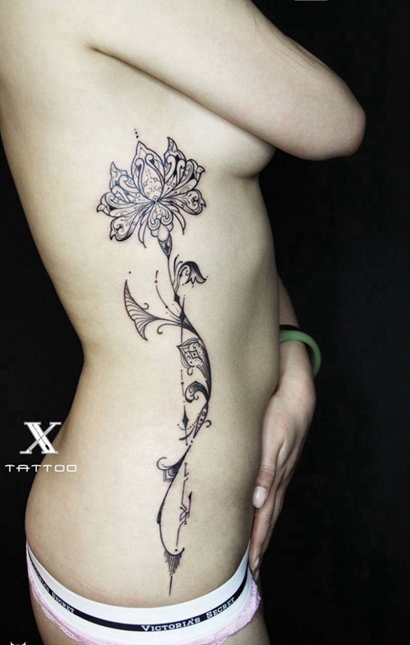 荷花纹身图片_腰部清新成品植物概念原创纹身图案