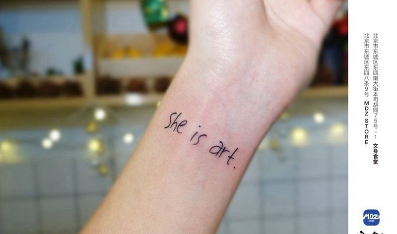 无标题纹身图片_手臂文字纹身图案