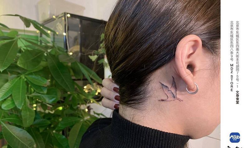 鹤纹身图片_颈部点刺纹身图案