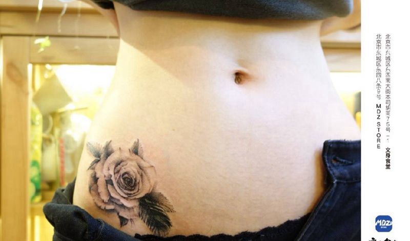 覆盖纹身图片_腰部点刺纹身图案