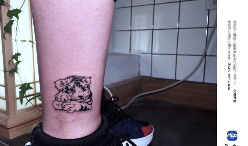 虎纹身图片_腿部纹身图案