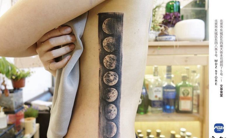 文身遮盖纹身图片_腰部水墨纹身图案