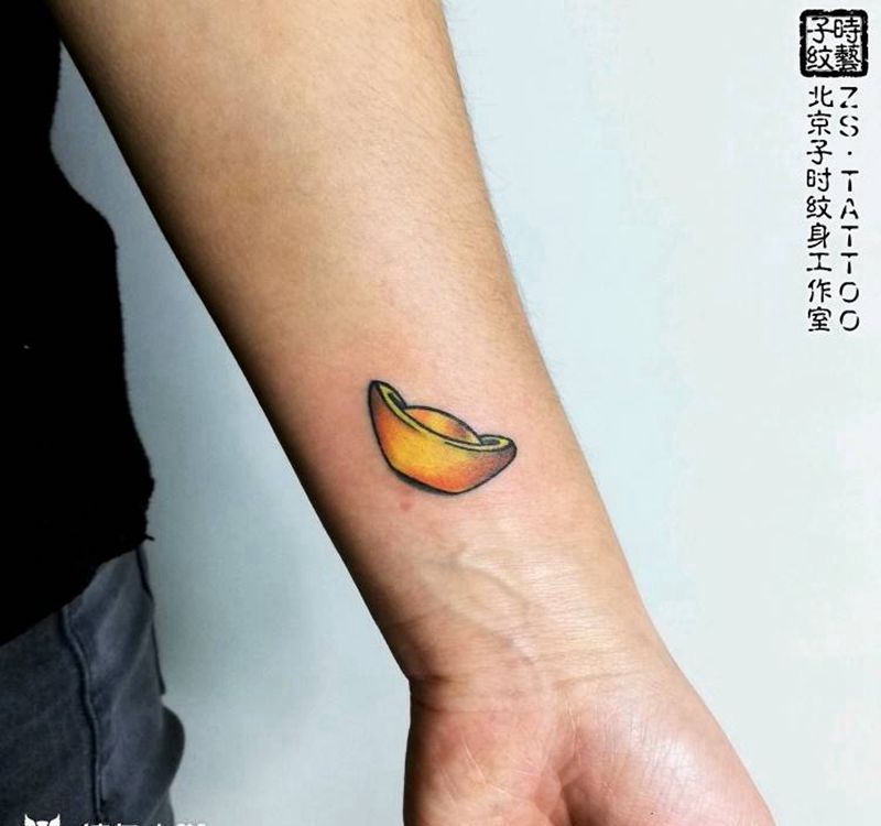 元宝纹身图片_手臂欧美写实纹身图案