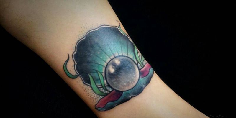 贝壳纹身图片_腿部欧美传统写实动物成品纹身图案